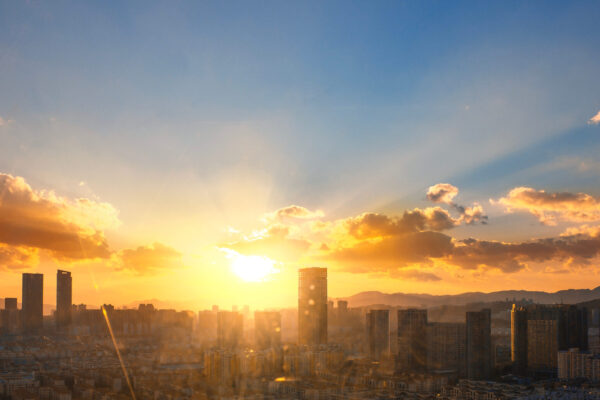 Aerial view of dramatic sunset or sunrise and blue sky